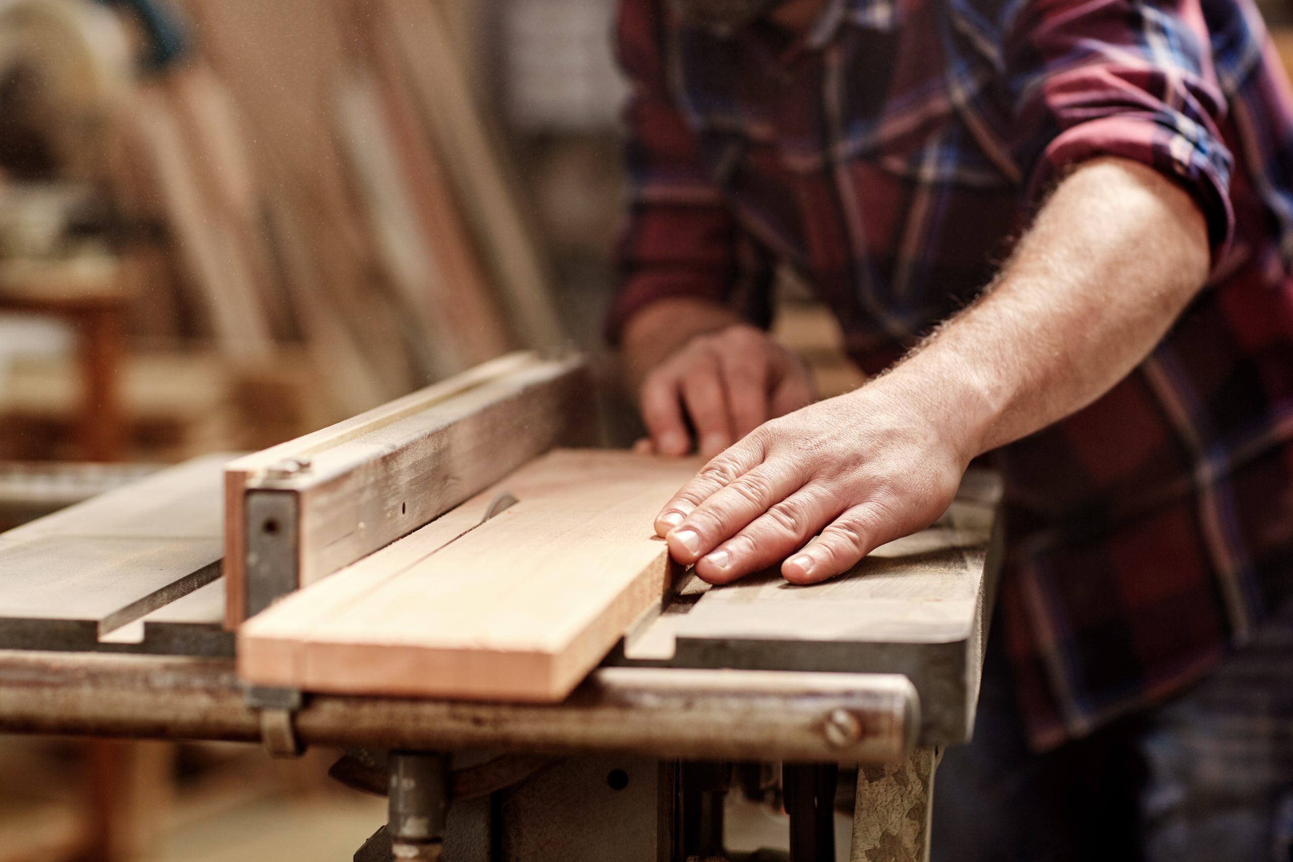 Cropped,Image,Of,The,Hands,Of,A,Skilled,Craftsman,Cutting